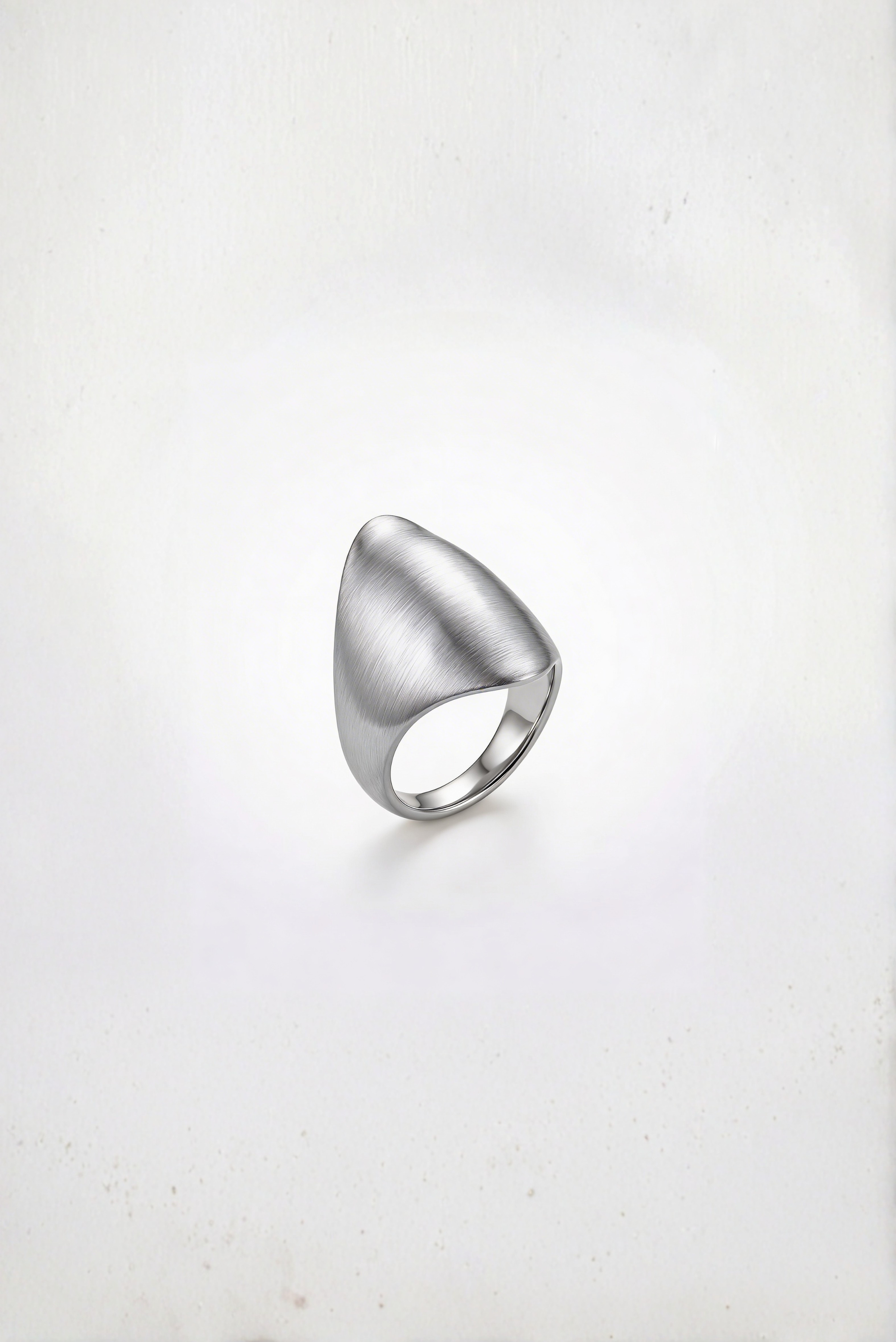 A bold silver ring shown on its own against a plain background