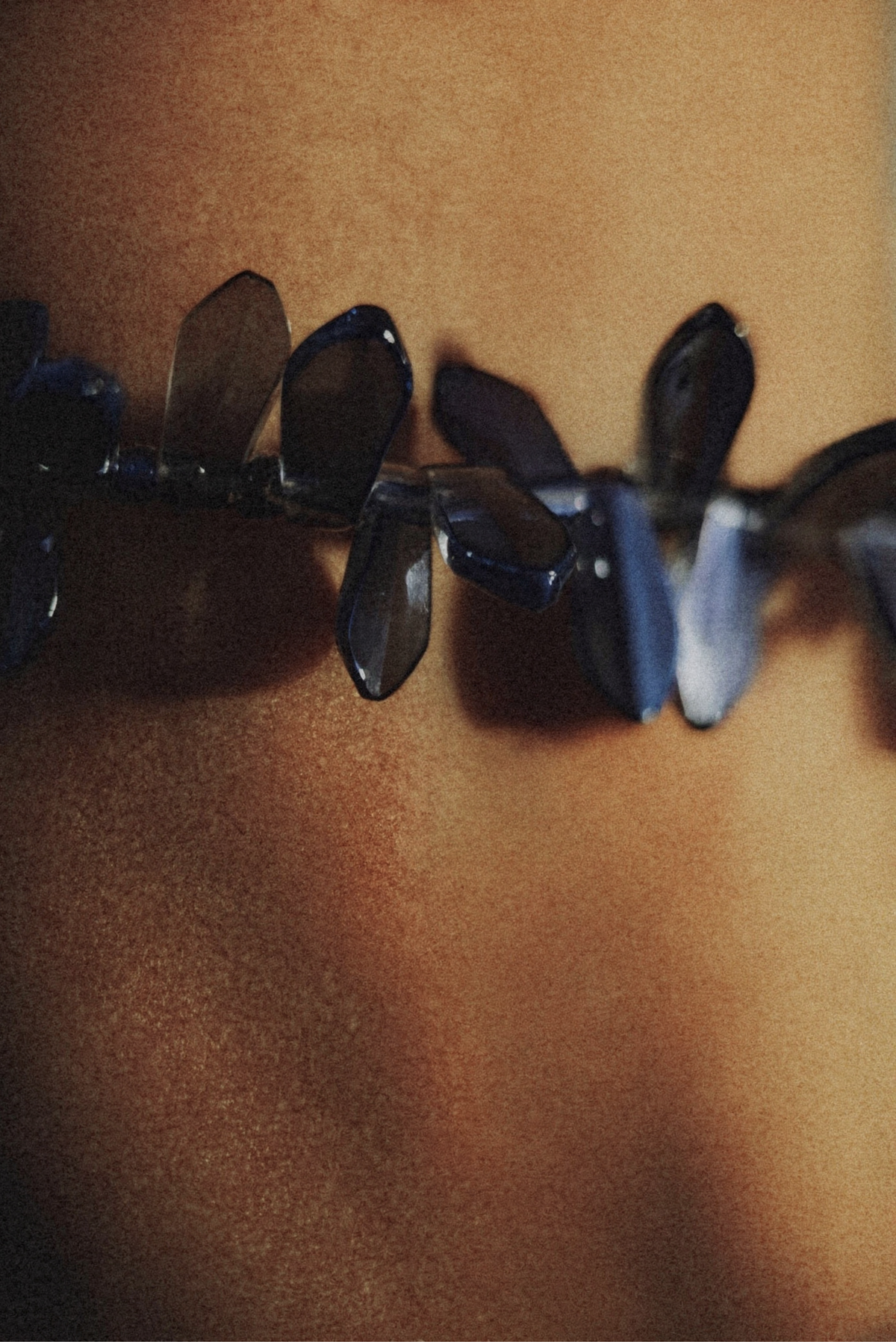 A crystal necklace styled as a single statement